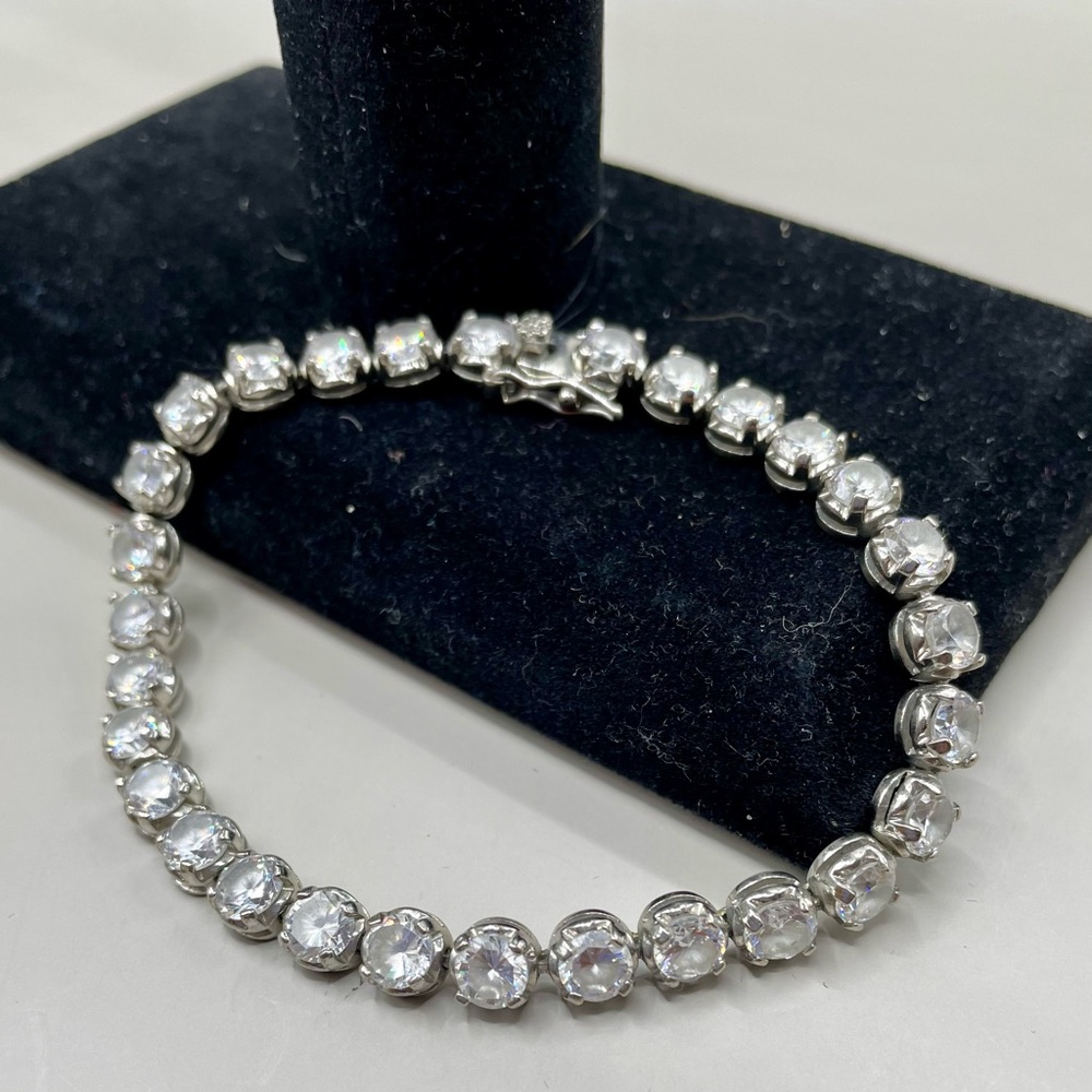 Dee Berkly rhinestone tennis bracelet with rounded faceted stones.